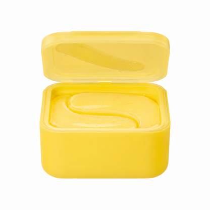 Yellow plastic container with a lid on a white background
