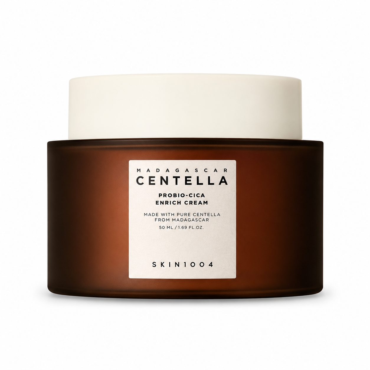 A jar of SKIN1004 Madagascar Centella Probio-Cica Enrich Cream featuring a dark amber glass-style base, a white screw-on cap, and a clean white label with minimalist text.