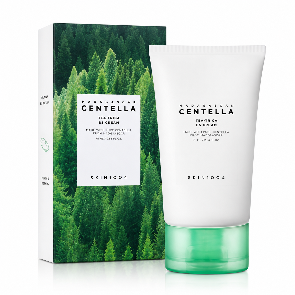 SKIN1004 Madagascar Centella Tea-Trica B5 Cream in a white squeeze tube with a green cap, standing next to its rectangular product packaging box featuring a green pine forest design.