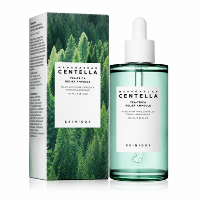 SKIN1004 Madagascar Centella Tea-Trica Relief Ampoule in a clear glass dropper bottle filled with a light green liquid, standing next to its rectangular product packaging box featuring a green forest background design.